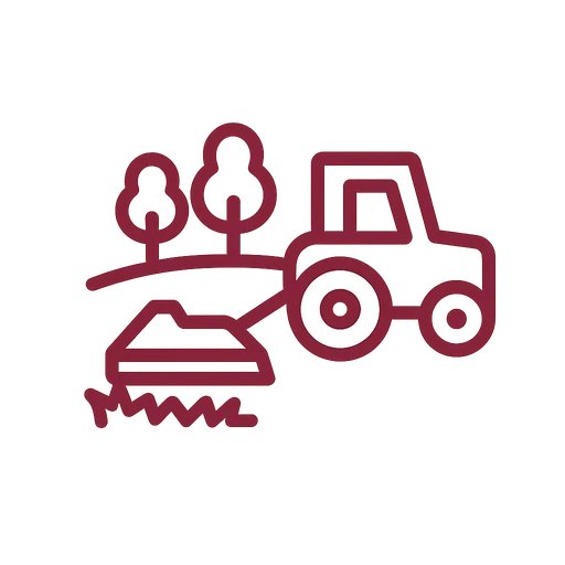 Tractor with rotary cutter mowing a tall grass field